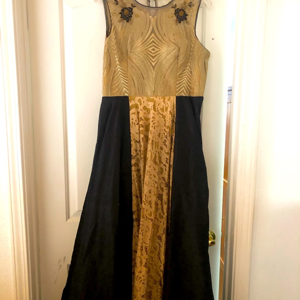 Black and gold Indian outfits.